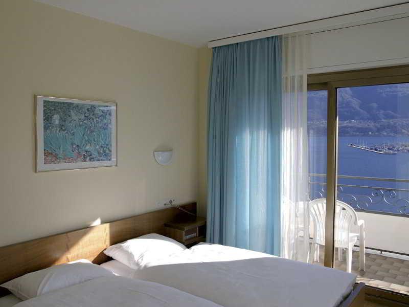 Hotel Geranio Au Lac Muralto Quarto foto